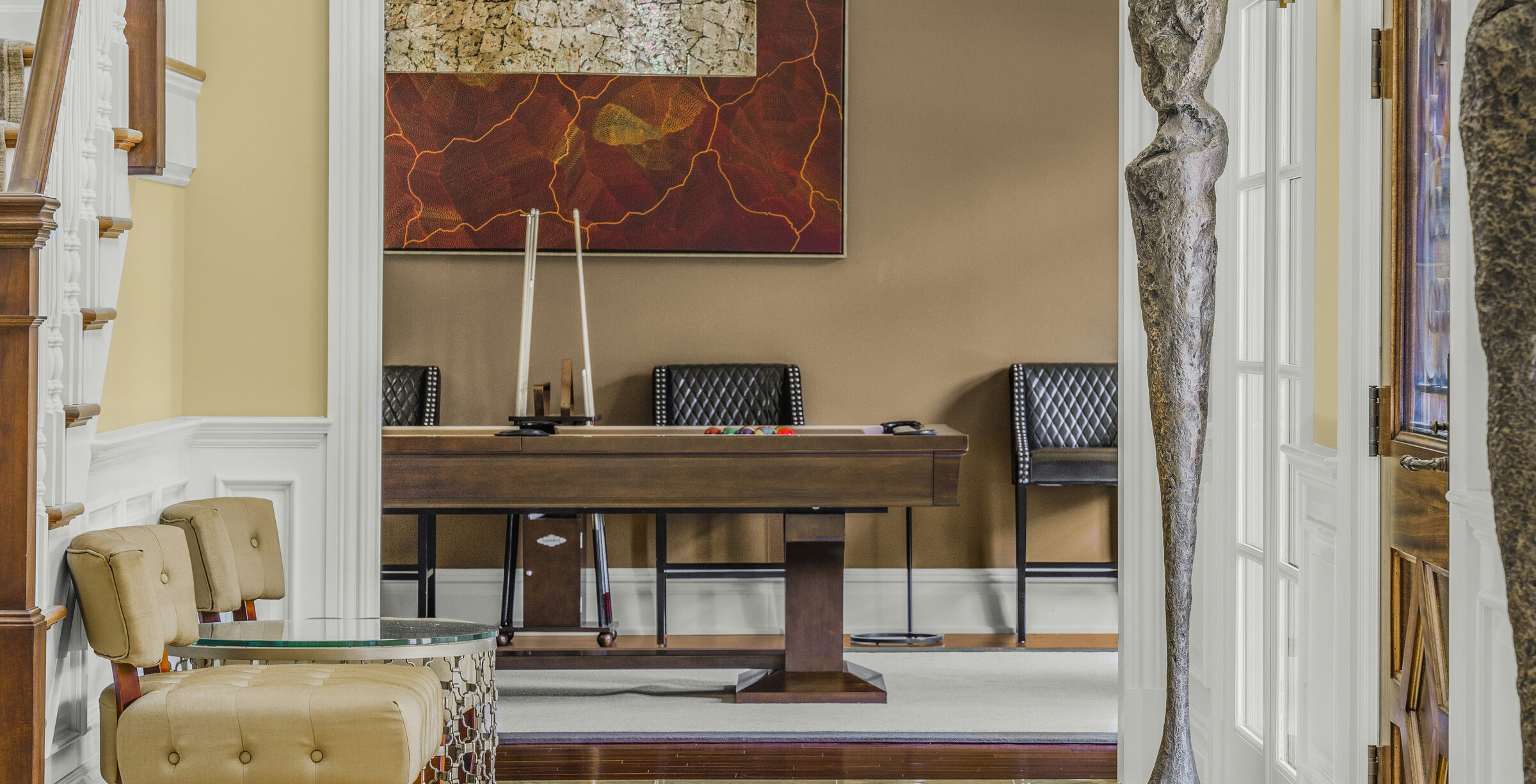 billiards room with refined millwork at The Princeton Preserve