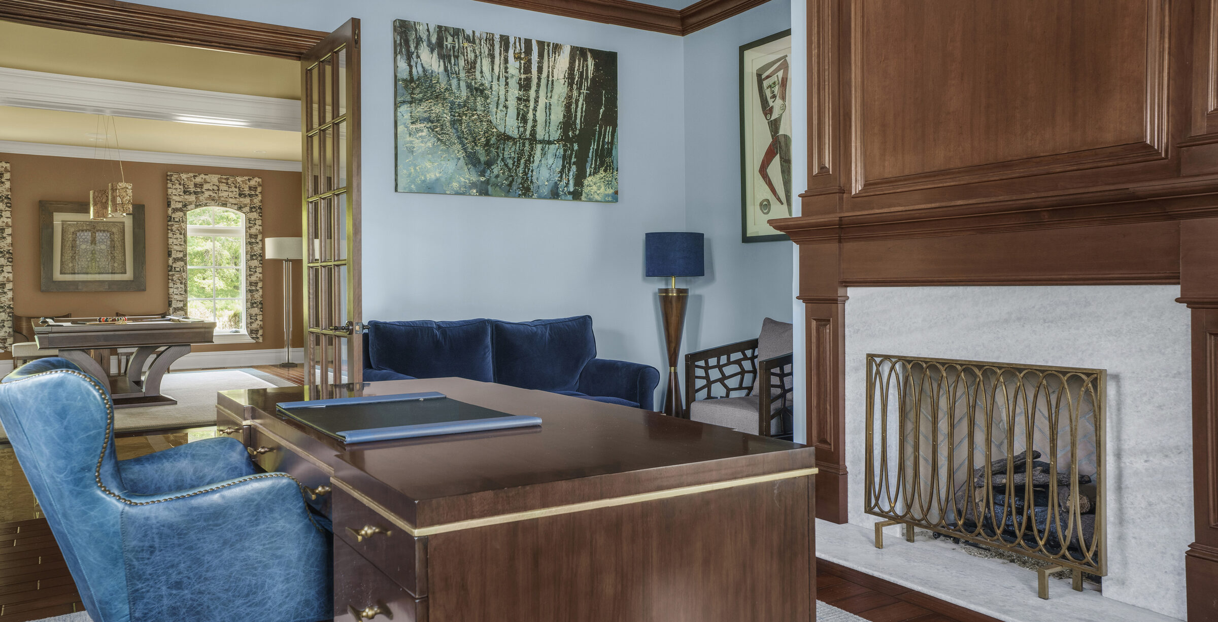 office with a gas fireplace and windows onto the grounds at The Princeton Preserve